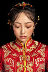 Asian girls wearing ancient clothes on black background