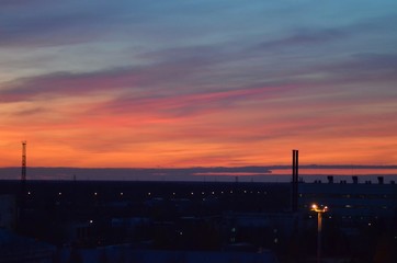  Orange sunset, colorful sky. The clouds. Electric tower.