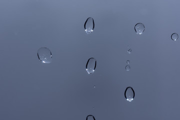 Close-up of drops of water on glass