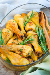 Grilled, baked, roasted chicken legs with rosemary and thyme