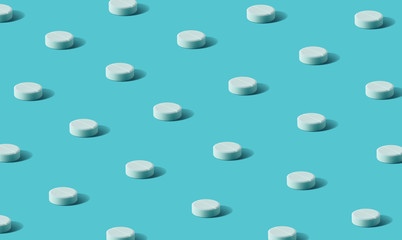 Flat lay of white round pills