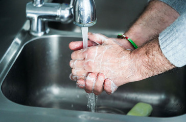Washing hands rubbing with soap man for corona virus prevention - 333240376