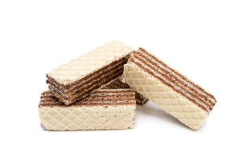 Crispy wafers with creamy hazelnut filling isolated on white background