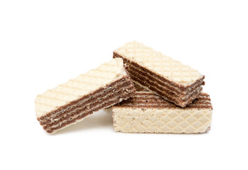 Crispy wafers with creamy hazelnut filling isolated on white background