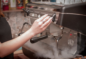 Barista prepares coffee