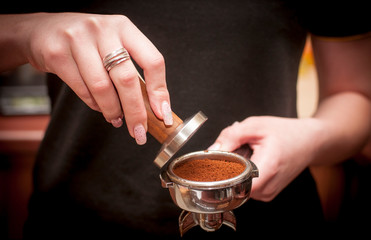 Fototapeta na wymiar Barista prepares coffee