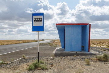 empty bus stop, waiting place for the bus in the steppe of Kazakhstan