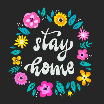 cute hand lettering quote 'Stay home' decorated with flowers on black background. Poster, card, sign, print, logo design. Quarantine, coronavirus theme