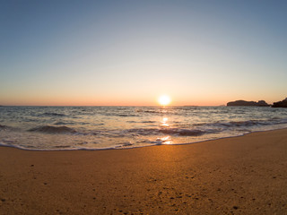 Fototapeta na wymiar Beautiful sunset on Falasarna beach in Crete Greece.