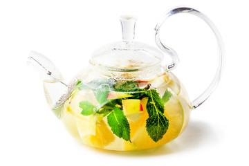 isolated glass transparent teapot with lemon on a white background
