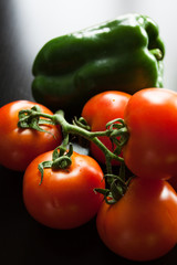 Still life of tomatoes and pepper. Manchego ratatouille ingredients. Mediterranean diet