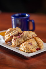 Three berry scones with coffee