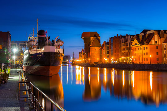 Gdansk with beautiful old town over Motlawa river at night, Poland.