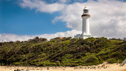Fototapeta na wymiar White lighthouse in Nelson Bay NSW