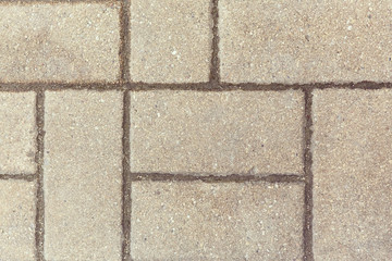 Grey paving slabs. Horizontal and vertical rectangles.