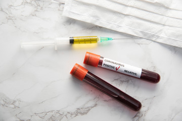 corona virus vaccine with blood sample and protection medical mask 