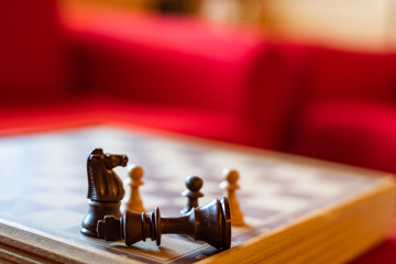 Chess board with pieces in checkmate position
