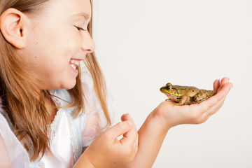 Happy Princess Girl Holding a Frog, Fairy Tale Magic