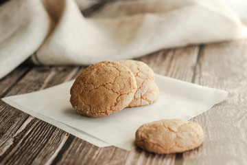 Almond cookies on the wood table. Romantic composition