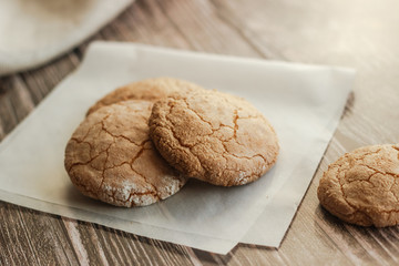 Almond cookies on the wood table. Romantic composition