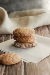 Almond cookies on the wood table. Romantic composition