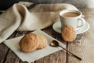 Almond cookies on the wood table. Romantic composition