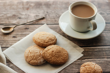 Almond cookies on the wood table. Romantic composition