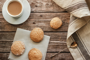 Almond cookies on the wood table. Romantic composition