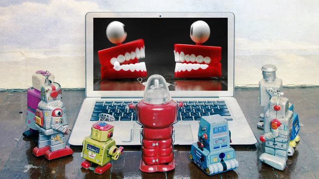 cinemagraph retro robots watching a toy chat show