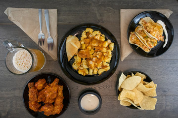 Sports bar restaurant food flat lay