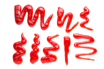 Red tomato ketchup splashes isolated on white background,