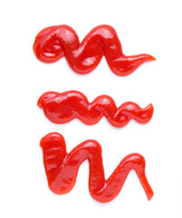 Red tomato ketchup splashes isolated on white background,