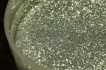 Glitter in a container (closeup, macro)