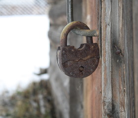 padlock on old door