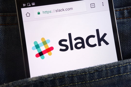 KONSKIE, POLAND - JUNE 02, 2018: Slack website displayed on smartphone hidden in jeans pocket
