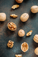 Top view on a heap of walnuts on a table.