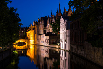 Fototapeta premium Beautiful medieval city of Bruges in Belgium (Europe). Full of bridges and water channels, surrounded by fantastic buildings.