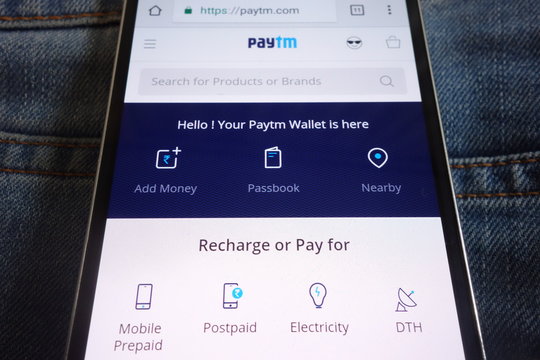KONSKIE, POLAND - JUNE 02, 2018: Paytm website displayed on smartphone hidden in jeans pocket
