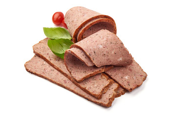 Sliced homemade turkey meatloaf, isolated on white background