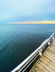 wooden promenade with seascape