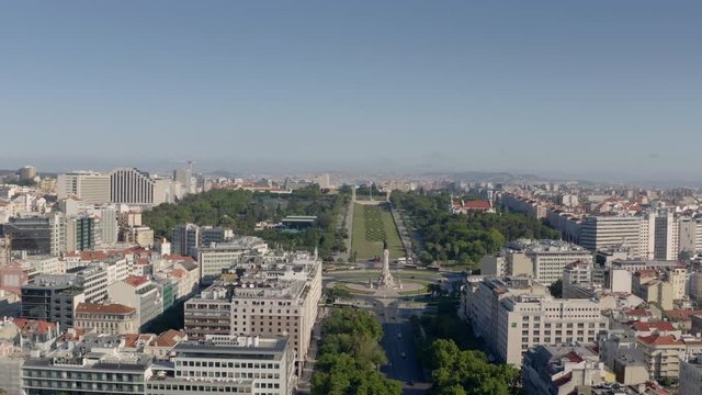 Lisbon aerial view of Marques de Pombal. Beautiful park in the middle of the city. Famous roundabout drone shot.