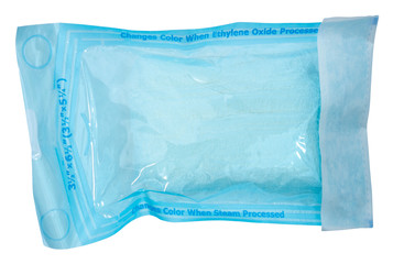Isolated sterile gauze dressing in blue packaging.