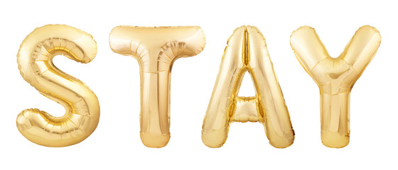 Stay word made of golden inflatable balloons isolated on white background