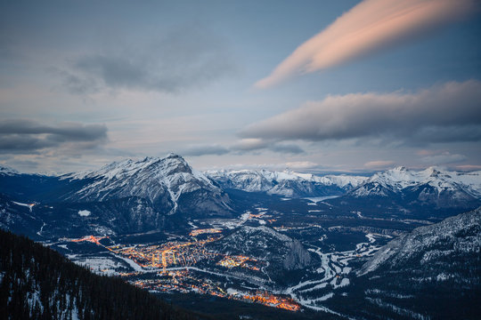 Winter blue hour after sunset at Banff Gondola, aerial view of Banff, Canadian Rockies, Alberta Canada