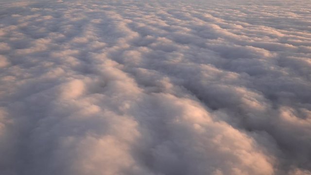 Air travel over clouds into a vacation