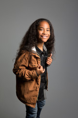 Fototapeta premium Studio portrait of an excited boy