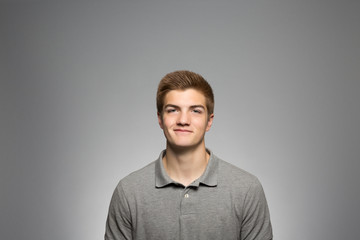 Obraz premium Studio portrait of a confident young man