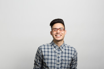 Fototapeta premium Studio portrait of an excited young man