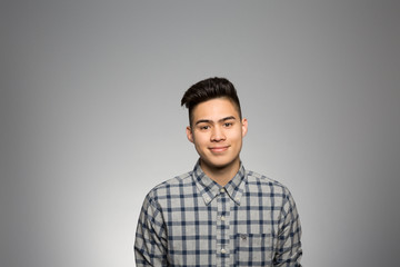 Obraz premium Studio portrait of a thoughtful young man