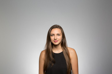 Naklejka premium Studio portrait of a thoughtful young woman